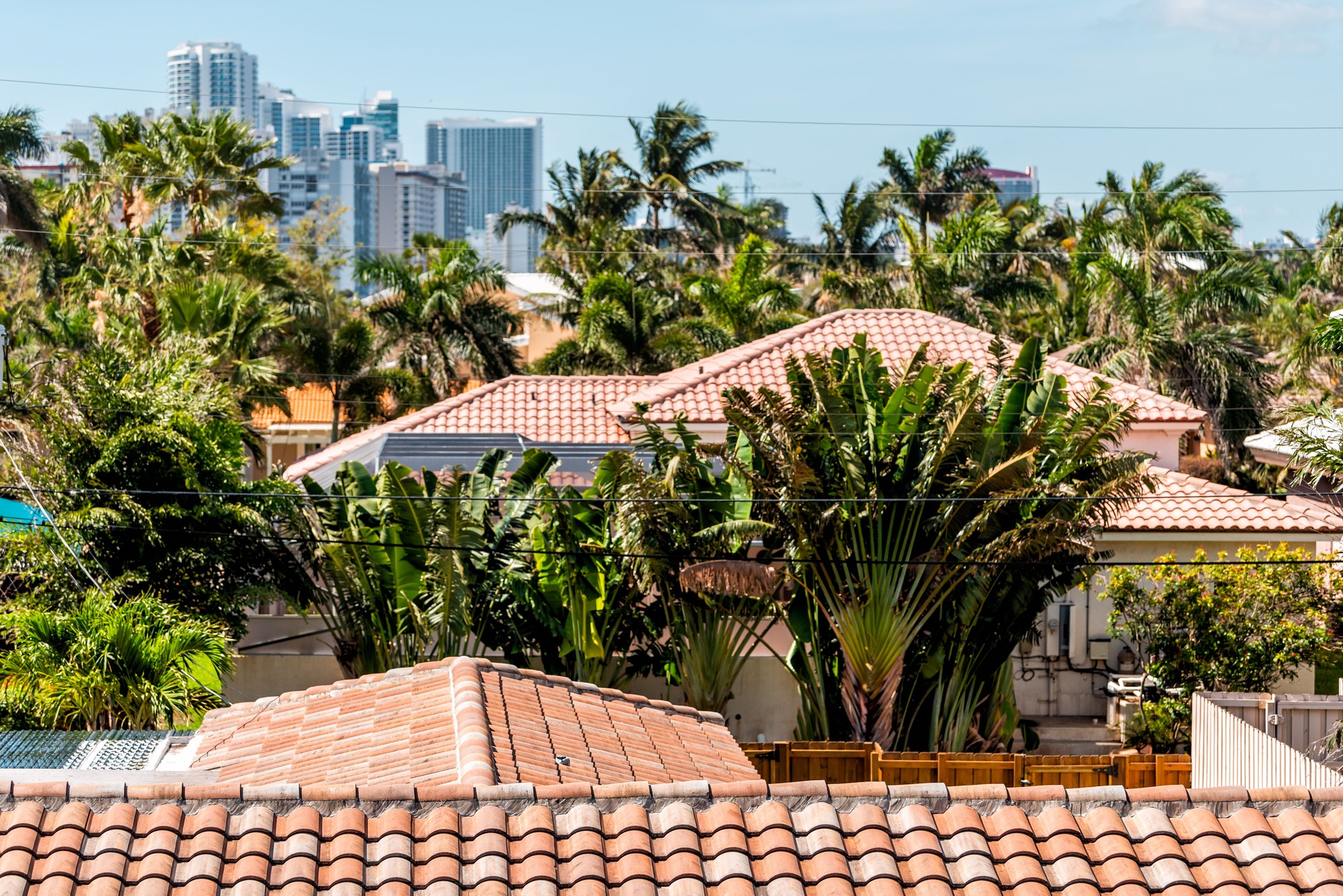Hollywood, Florida in Miami beach Broward area with cityscape skyline of residential skyscrapers coastal buildings and rooftops tiles aerial view on sunny day